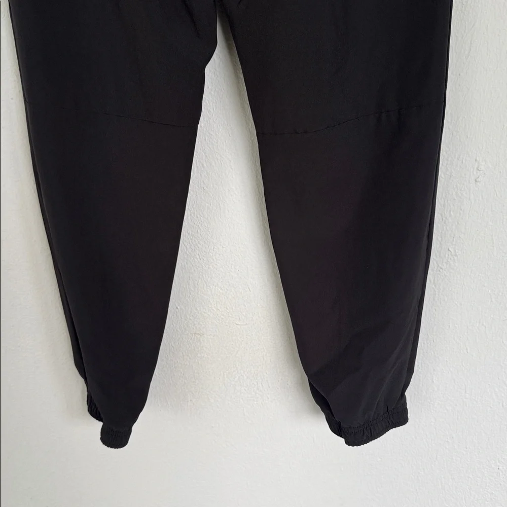 Athletic Works DriWorks girl’s black tapered ankle windbreaker joggers size XL